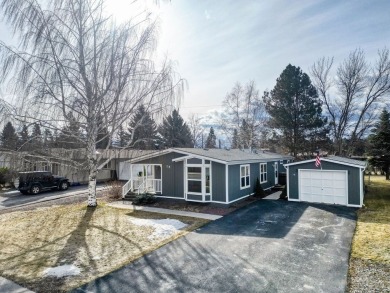Discover the perfect blend of comfort  convenience in this on Village Greens Golf Club in Montana - for sale on GolfHomes.com, golf home, golf lot