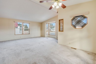 Discover the perfect blend of comfort  convenience in this on Village Greens Golf Club in Montana - for sale on GolfHomes.com, golf home, golf lot