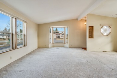 Discover the perfect blend of comfort  convenience in this on Village Greens Golf Club in Montana - for sale on GolfHomes.com, golf home, golf lot