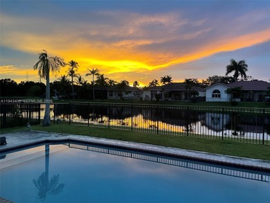 Experience luxury living in Weston Hills, a premier gated golf on Weston Hills Country Club in Florida - for sale on GolfHomes.com, golf home, golf lot