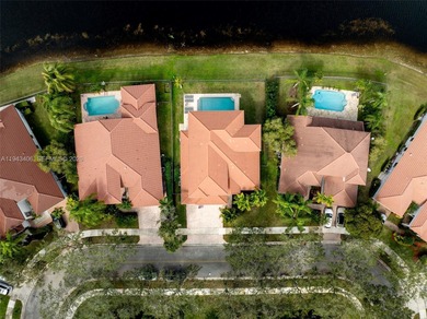 Experience luxury living in Weston Hills, a premier gated golf on Weston Hills Country Club in Florida - for sale on GolfHomes.com, golf home, golf lot