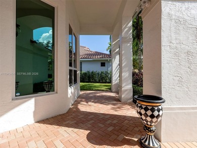 Experience luxury living in Weston Hills, a premier gated golf on Weston Hills Country Club in Florida - for sale on GolfHomes.com, golf home, golf lot