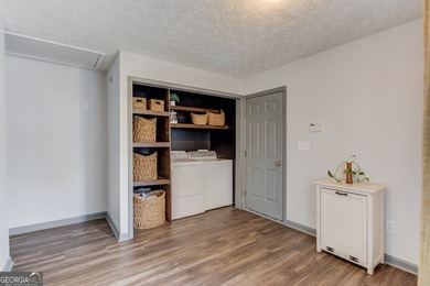 Fresh updates, 1.47 acres, and NO HOA make this Monroe property on Monroe Golf and Country Club in Georgia - for sale on GolfHomes.com, golf home, golf lot