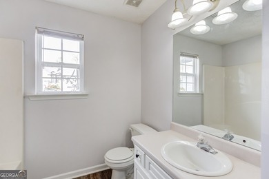 Fresh updates, 1.47 acres, and NO HOA make this Monroe property on Monroe Golf and Country Club in Georgia - for sale on GolfHomes.com, golf home, golf lot