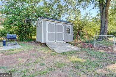 Comfort, Character, and Convenience. Welcome to 6129 Linwood on Indian Creek Golf Club in Georgia - for sale on GolfHomes.com, golf home, golf lot