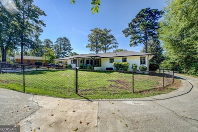 Comfort, Character, and Convenience. Welcome to 6129 Linwood on Indian Creek Golf Club in Georgia - for sale on GolfHomes.com, golf home, golf lot