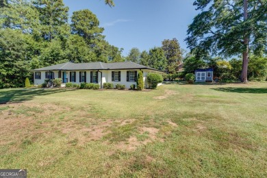 Comfort, Character, and Convenience. Welcome to 6129 Linwood on Indian Creek Golf Club in Georgia - for sale on GolfHomes.com, golf home, golf lot