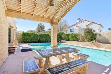 This stunning home boasts soaring vaulted ceilings, creating an on Painted Desert Golf Club in Nevada - for sale on GolfHomes.com, golf home, golf lot