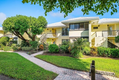 Enjoy resort-style living in this beautifully updated 3-bedroom on Quail Ridge Golf Course and Country Club in Florida - for sale on GolfHomes.com, golf home, golf lot