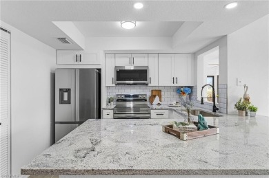 Beautifully remodeled 1st floor condo with incredible panoramic on Hideaway Country Club in Florida - for sale on GolfHomes.com, golf home, golf lot
