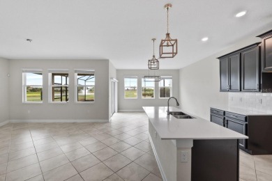 Modern living awaits in this stunning 4-bedroom, 3-bathroom home on ChampionsGate Golf Resort in Florida - for sale on GolfHomes.com, golf home, golf lot