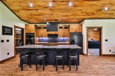 Experience luxury living in this masterfully crafted 2024 built on Blueberry Pines Golf CLub in Minnesota - for sale on GolfHomes.com, golf home, golf lot