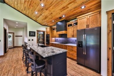 Experience luxury living in this masterfully crafted 2024 built on Blueberry Pines Golf CLub in Minnesota - for sale on GolfHomes.com, golf home, golf lot