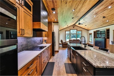 Experience luxury living in this masterfully crafted 2024 built on Blueberry Pines Golf CLub in Minnesota - for sale on GolfHomes.com, golf home, golf lot