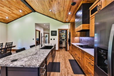 Experience luxury living in this masterfully crafted 2024 built on Blueberry Pines Golf CLub in Minnesota - for sale on GolfHomes.com, golf home, golf lot
