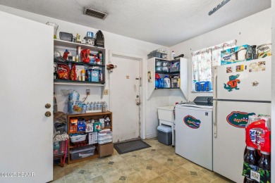 Spacious 5-Bedroom Home in Sought-After Tomoka Oaks! Welcome to on Tomoka Oaks Golf and Country Club in Florida - for sale on GolfHomes.com, golf home, golf lot