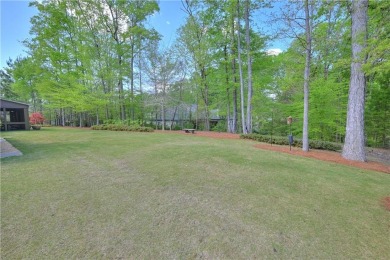 Stunning! Welcome to 1707 Candler Way, where timeless elegance on Moores Mill Golf Club in Alabama - for sale on GolfHomes.com, golf home, golf lot