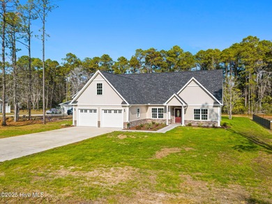 Stunning custom 3 bedroom, 3 bathroom plus a bonus room home in on Carolina Shores Golf Course in North Carolina - for sale on GolfHomes.com, golf home, golf lot