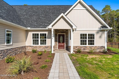 Stunning custom 3 bedroom, 3 bathroom plus a bonus room home in on Carolina Shores Golf Course in North Carolina - for sale on GolfHomes.com, golf home, golf lot