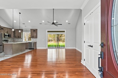 Stunning custom 3 bedroom, 3 bathroom plus a bonus room home in on Carolina Shores Golf Course in North Carolina - for sale on GolfHomes.com, golf home, golf lot