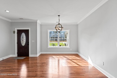 Stunning custom 3 bedroom, 3 bathroom plus a bonus room home in on Carolina Shores Golf Course in North Carolina - for sale on GolfHomes.com, golf home, golf lot