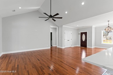 Stunning custom 3 bedroom, 3 bathroom plus a bonus room home in on Carolina Shores Golf Course in North Carolina - for sale on GolfHomes.com, golf home, golf lot