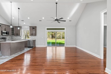 Stunning custom 3 bedroom, 3 bathroom plus a bonus room home in on Carolina Shores Golf Course in North Carolina - for sale on GolfHomes.com, golf home, golf lot