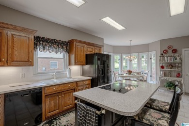 One-owner, brick home with stunning landscaping and timeless on Riverchase Country Club in Alabama - for sale on GolfHomes.com, golf home, golf lot
