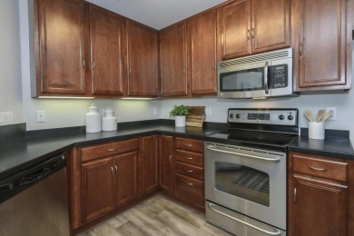 Turn-key 1BR/1BA + den end-unit condo in Pewaukee's popular on Willow Run Golf Club in Wisconsin - for sale on GolfHomes.com, golf home, golf lot