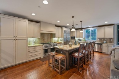 Welcome to this stunning former model home, lovingly updated on The Santaluz Club in California - for sale on GolfHomes.com, golf home, golf lot