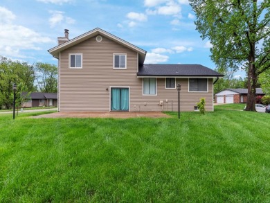 Welcome to this beautifully maintained split-level home on Lake Saint Louis Par 3 in Missouri - for sale on GolfHomes.com, golf home, golf lot