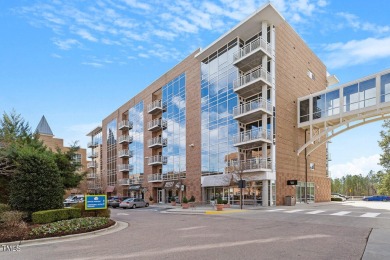 Upscale living in this end unit beauty! Views of bustling East on The UNC Finley Golf Club in North Carolina - for sale on GolfHomes.com, golf home, golf lot