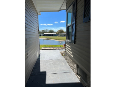 2 bed | 2 bath | 1,456 sq ft | Lot 189 | $105,000    If you've on Lake Henry Golf Club in Florida - for sale on GolfHomes.com, golf home, golf lot