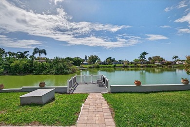 Wake up to peaceful waterfront views and glowing Gulf Coast on Jacaranda West Country Club in Florida - for sale on GolfHomes.com, golf home, golf lot