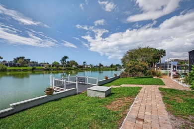 Wake up to peaceful waterfront views and glowing Gulf Coast on Jacaranda West Country Club in Florida - for sale on GolfHomes.com, golf home, golf lot