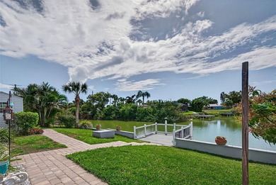 Wake up to peaceful waterfront views and glowing Gulf Coast on Jacaranda West Country Club in Florida - for sale on GolfHomes.com, golf home, golf lot
