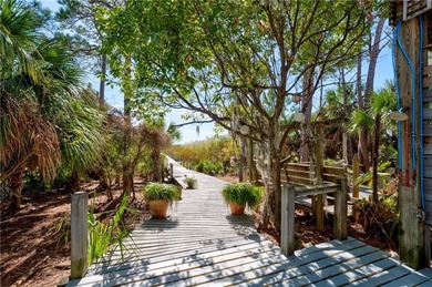 Welcome to 705 Hernando Place. This home has been truly loved on Isle Dauphine Club Golf Course in AL - for sale on GolfHomes.com, golf home, golf lot