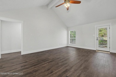 This cozy Diamondhead gem has been beautifully renovated and is on Diamondhead Country Club in Mississippi - for sale on GolfHomes.com, golf home, golf lot