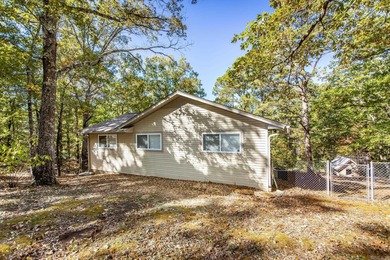 Discover your own slice of paradise with this secluded home on Mountain Ranch Golf Club in Arkansas - for sale on GolfHomes.com, golf home, golf lot