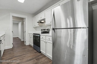 This cozy Diamondhead gem has been beautifully renovated and is on Diamondhead Country Club in Mississippi - for sale on GolfHomes.com, golf home, golf lot