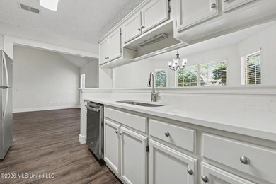 This cozy Diamondhead gem has been beautifully renovated and is on Diamondhead Country Club in Mississippi - for sale on GolfHomes.com, golf home, golf lot