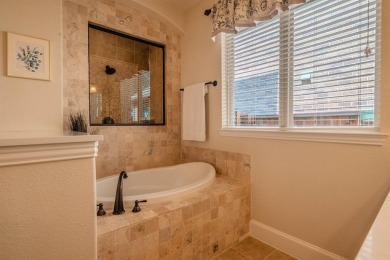 This ideal family home sits in the heart of Stonebridge Ranch in on Stonebridge Ranch Country Club - Dye in Texas - for sale on GolfHomes.com, golf home, golf lot