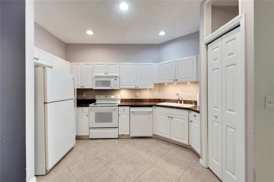 Enjoy resort-style living just minutes from Florida's best on East Bay Golf Club in Florida - for sale on GolfHomes.com, golf home, golf lot