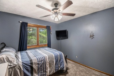 Stunning 2-story home features vaulted ceilings and a spacious on Hankerd Hills Golf Course in Michigan - for sale on GolfHomes.com, golf home, golf lot