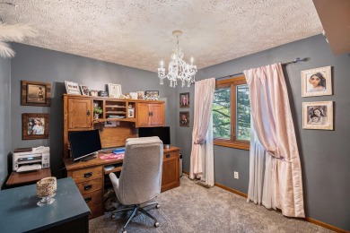Stunning 2-story home features vaulted ceilings and a spacious on Hankerd Hills Golf Course in Michigan - for sale on GolfHomes.com, golf home, golf lot