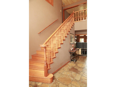 Welcome to 10812 Bay Ridge Drive -- a beautiful two-story home on Lions Den Golf Club in Arkansas - for sale on GolfHomes.com, golf home, golf lot