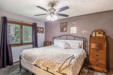 Stunning 2-story home features vaulted ceilings and a spacious on Hankerd Hills Golf Course in Michigan - for sale on GolfHomes.com, golf home, golf lot