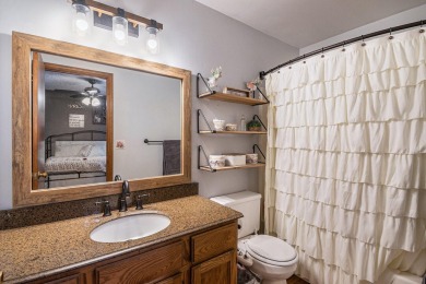 Stunning 2-story home features vaulted ceilings and a spacious on Hankerd Hills Golf Course in Michigan - for sale on GolfHomes.com, golf home, golf lot