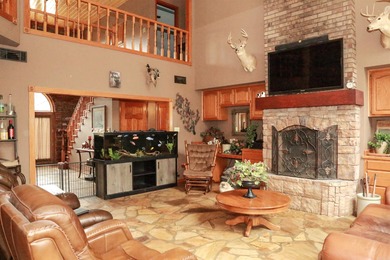 Welcome to 10812 Bay Ridge Drive -- a beautiful two-story home on Lions Den Golf Club in Arkansas - for sale on GolfHomes.com, golf home, golf lot