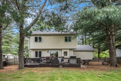Stunning 2-story home features vaulted ceilings and a spacious on Hankerd Hills Golf Course in Michigan - for sale on GolfHomes.com, golf home, golf lot